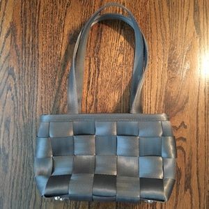 Harvey’s Mercedes Seatbelt Purse